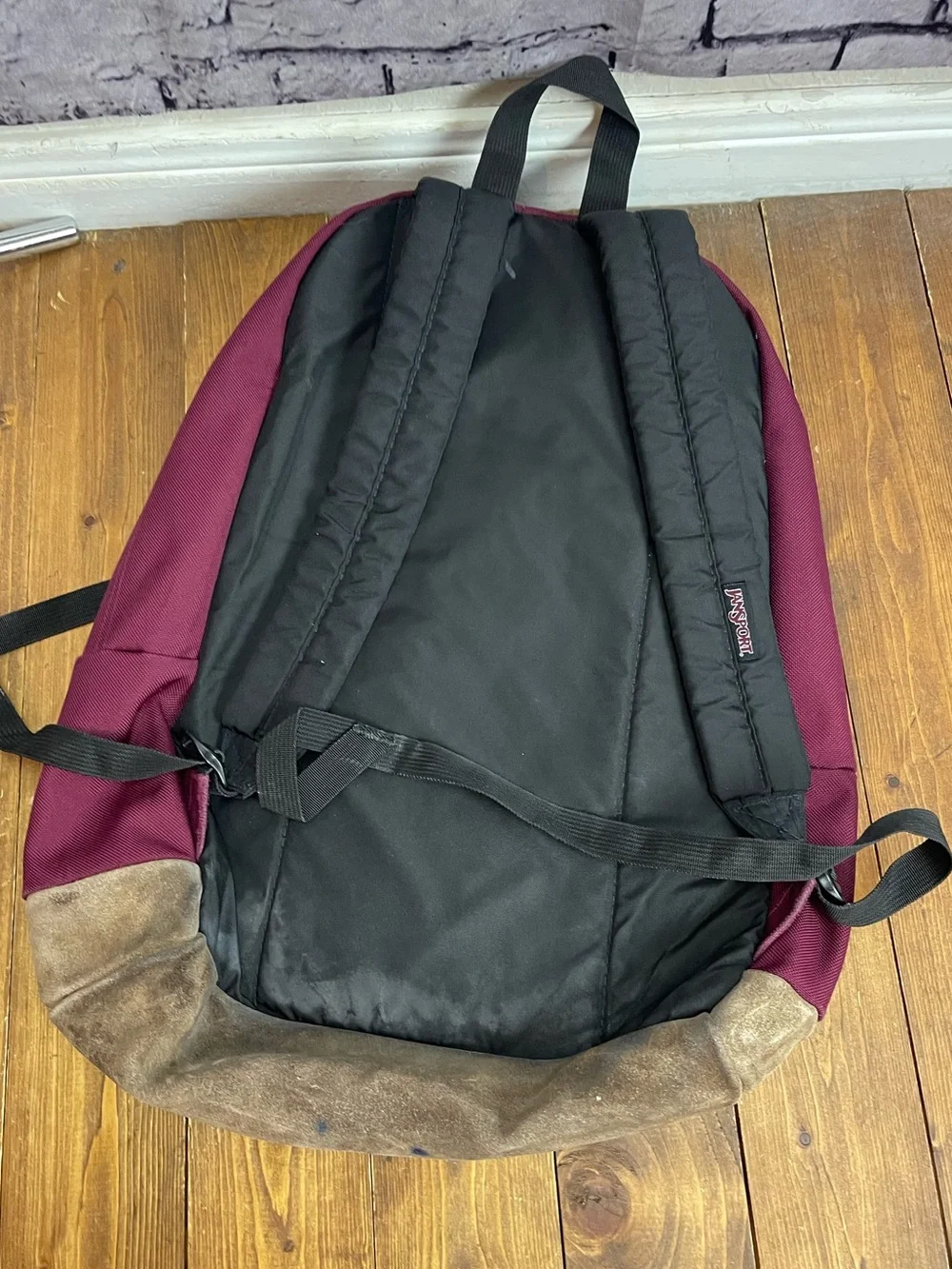 Jansport right pack back pack dark red with tan suede bottom